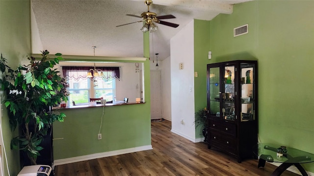 1718 Gentle Wind Dr, Arlington, TX 76018 - interior space featuring wood finished floors, ceiling fan, high vaulted ceiling, beam ceiling, and a textured ceiling