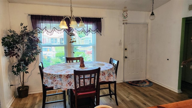 1718 Gentle Wind Dr, Arlington, TX 76018 - dining room featuring wood finished floors and a chandelier