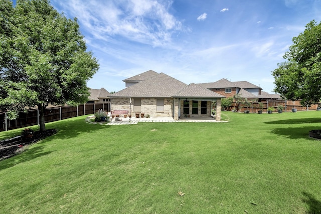 12400 Outlook Ave, Fort Worth, TX 76244 - rear view of property with a patio, a fenced backyard, and roof with shingles