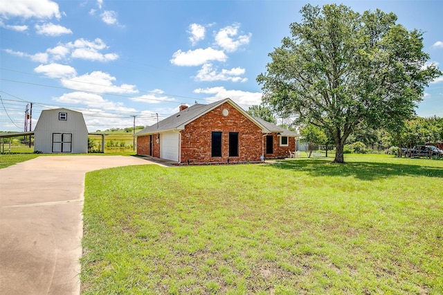134 Northchase Dr, Willow Park, TX 76087 - view of property exterior with brick siding, a lawn, driveway, an outbuilding, and a detached garage