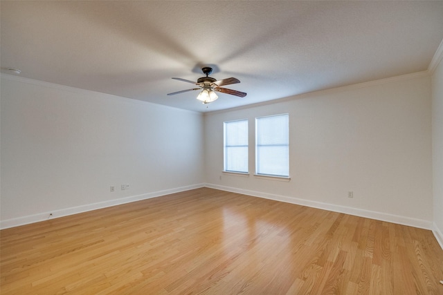 871 Kitty Hawk Ln, Grand Prairie, TX 75051 - empty room featuring ornamental molding, a ceiling fan, baseboards, and light wood-type flooring