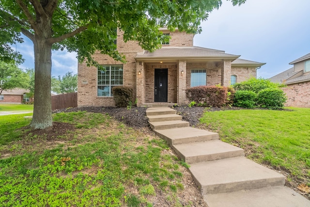 7001 Bickers Dr, Rowlett, TX 75089 - view of front of home featuring brick siding