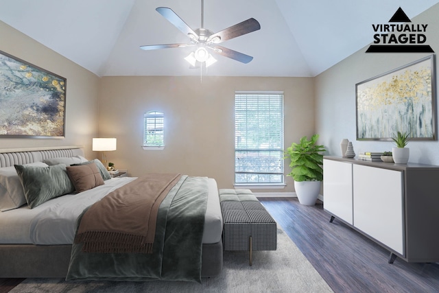7001 Bickers Dr, Rowlett, TX 75089 - bedroom with lofted ceiling, dark wood-style floors, a ceiling fan, and baseboards