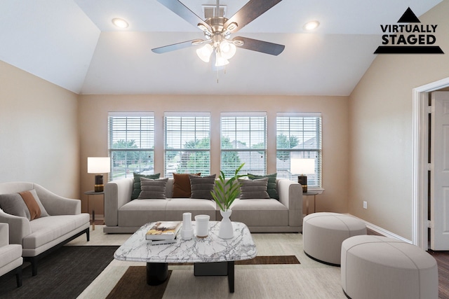 7001 Bickers Dr, Rowlett, TX 75089 - living room with lofted ceiling, ceiling fan, baseboards, recessed lighting, and wood finished floors