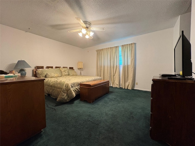 1605 NE 17th, Paris, TX 75460 - carpeted bedroom with a textured ceiling and a ceiling fan