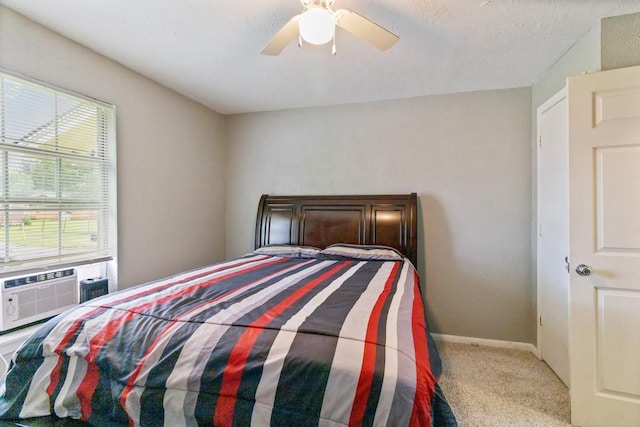 813 Pine St, Teague, TX 75860 - bedroom with carpet and a ceiling fan