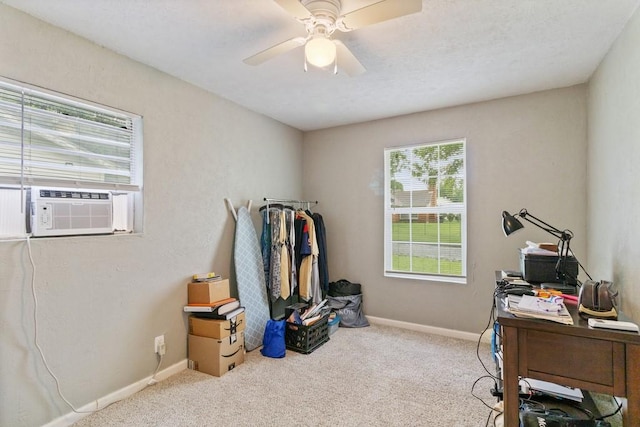 813 Pine St, Teague, TX 75860 - home office featuring carpet flooring, ceiling fan, and cooling unit