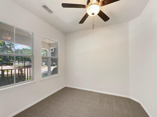 9903 Cedarcrest Dr, Providence Village, TX 76227 - spare room with dark carpet and ceiling fan