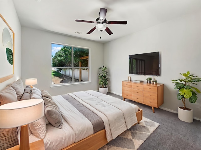 9903 Cedarcrest Dr, Providence Village, TX 76227 - bedroom with light colored carpet and ceiling fan