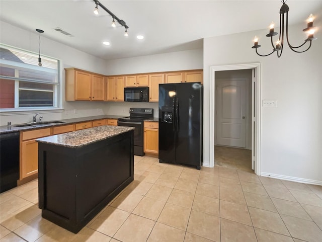 9903 Cedarcrest Dr, Providence Village, TX 76227 - kitchen featuring black appliances, a sink, light tile patterned floors, a chandelier, and pendant lighting