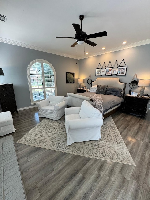 3904 Davis Cir, Plano, TX 75023 - bedroom featuring wood finished floors, ornamental molding, recessed lighting, ceiling fan, and baseboards