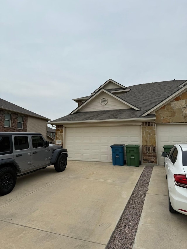 5001-5003 Sanger Circle Dr, Sanger, TX 76266 - view of side of home featuring a shingled roof, stone siding, and concrete driveway