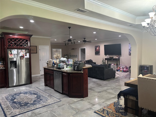 3307 Shawnee Trl, Lake Worth, TX 76135 - kitchen with appliances with stainless steel finishes, arched walkways, ceiling fan, a sink, and ornamental molding