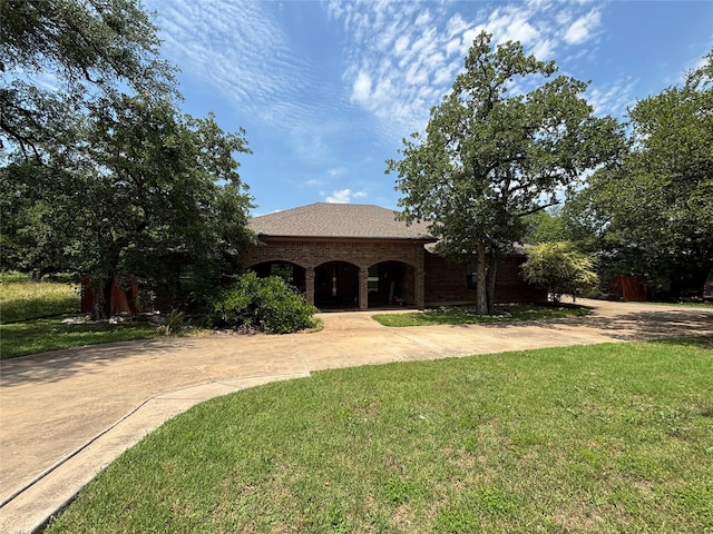 3307 Shawnee Trl, Lake Worth, TX 76135 - view of front of home featuring a front lawn and driveway