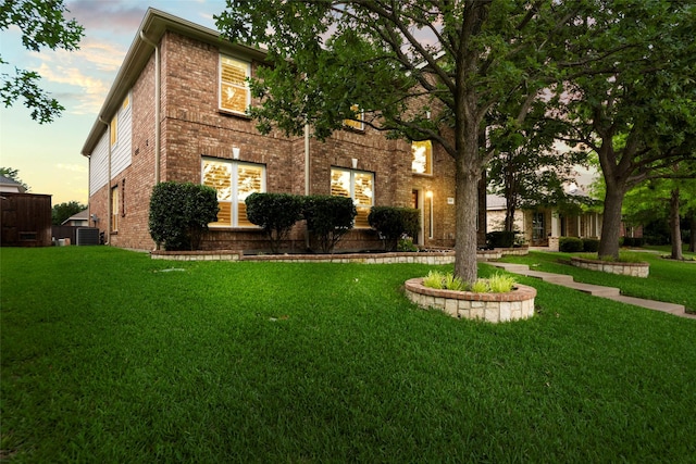 1557 Crystal Pass, Allen, TX 75002 - view of front of property with brick siding and a yard