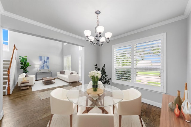 1557 Crystal Pass, Allen, TX 75002 - dining space with wood finished floors, crown molding, a chandelier, and stairs