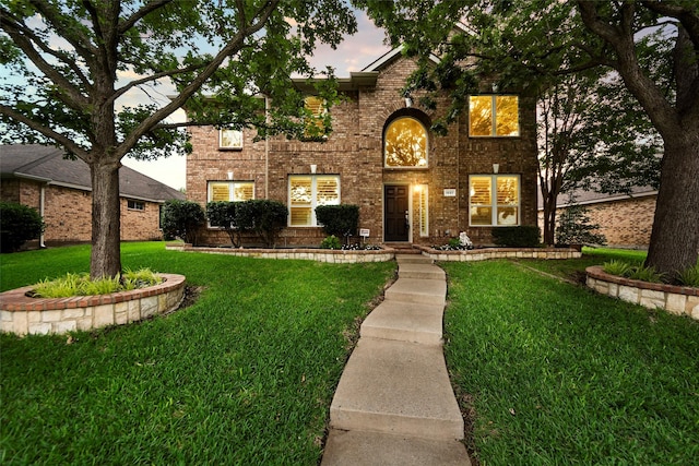1557 Crystal Pass, Allen, TX 75002 - traditional-style home with a front lawn and brick siding
