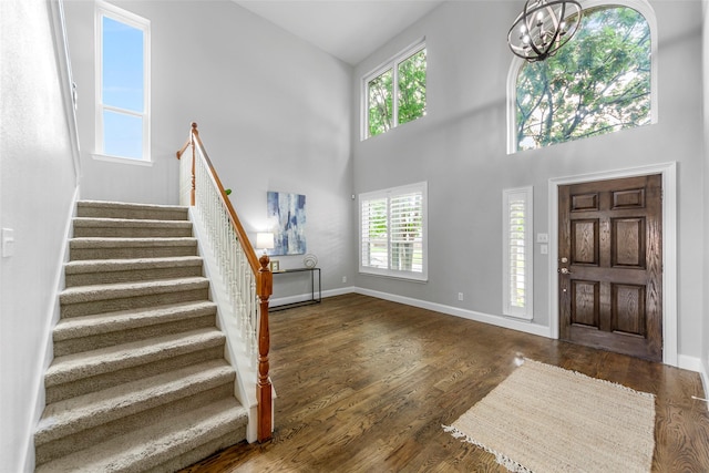 1557 Crystal Pass, Allen, TX 75002 - entrance foyer with stairs, wood finished floors, a chandelier, and a towering ceiling