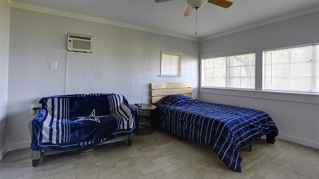 1307 Lakeshore Dr, Little Elm, TX 75068 - bedroom featuring a wall mounted AC, wood finished floors, baseboards, crown molding, and ceiling fan