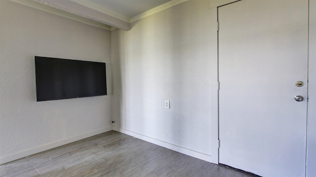 1307 Lakeshore Dr, Little Elm, TX 75068 - unfurnished bedroom featuring ornamental molding, wood finished floors, and baseboards