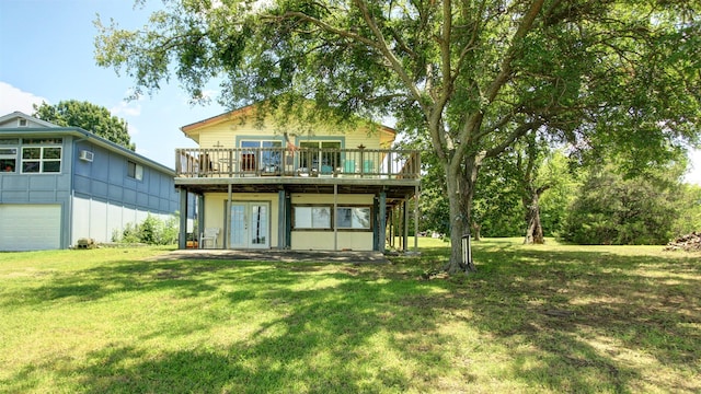 1307 Lakeshore Dr, Little Elm, TX 75068 - rear view of house featuring a wooden deck, a lawn, french doors, and board and batten siding