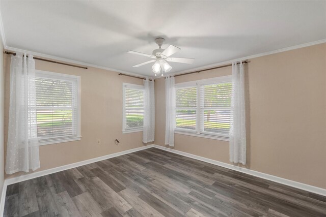 2225 Wooded Acres Dr, Waco, TX 76710 - spare room with dark wood-type flooring, a ceiling fan, and ornamental molding