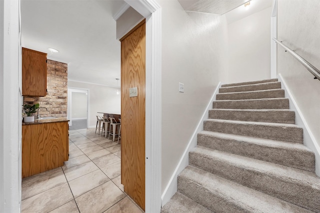 2225 Wooded Acres Dr, Waco, TX 76710 - stairway with tile patterned floors and baseboards