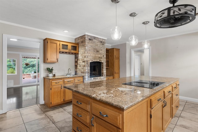 2225 Wooded Acres Dr, Waco, TX 76710 - kitchen featuring black electric stovetop, crown molding, a kitchen island, light stone counters, and light tile patterned floors