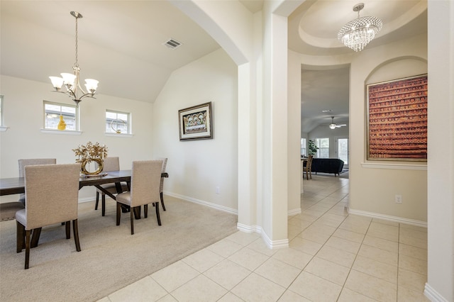 1926 Successful Dr, Wylie, TX 75098 - dining space featuring a chandelier, arched walkways, healthy amount of natural light, and vaulted ceiling
