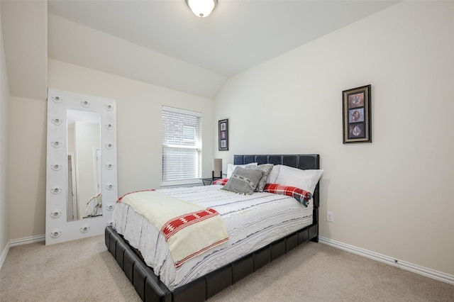 1926 Successful Dr, Wylie, TX 75098 - bedroom featuring light carpet, vaulted ceiling, and baseboards