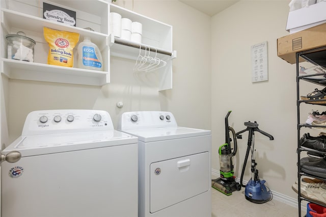 1926 Successful Dr, Wylie, TX 75098 - washroom with washing machine and dryer, tile patterned flooring, and baseboards
