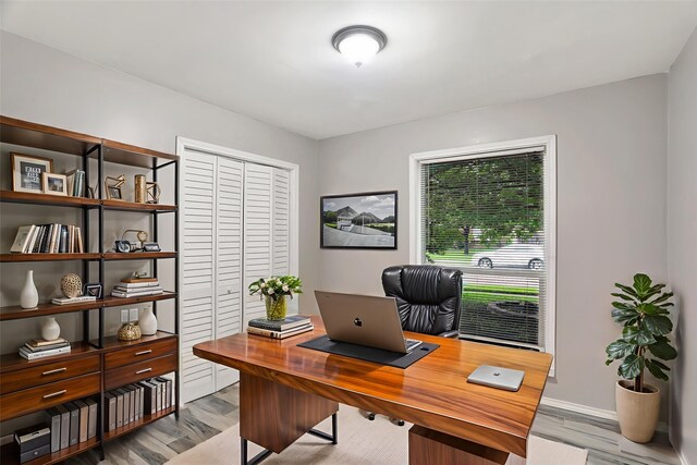 1510 Bowie St, Garland, TX 75042 - office featuring wood finished floors and baseboards