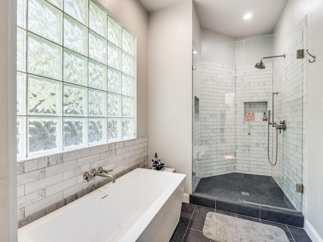 4112 Edith Ct, Dallas, TX 75220 - full bathroom featuring a freestanding tub, a stall shower, plenty of natural light, and recessed lighting