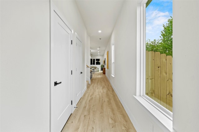 601 S Moore St, Dallas, TX 75203 - corridor with light wood finished floors, recessed lighting, and baseboards