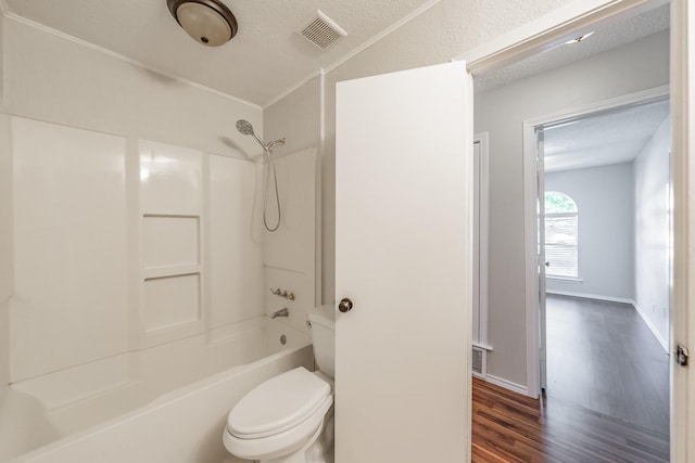 708 Simpson Ter, Bedford, TX 76021 - full bath with toilet, wood finished floors, and shower / tub combination