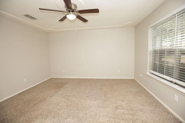 4209 W Pleasant Forest St, Arlington, TX 76015 - carpeted spare room with a ceiling fan and a textured ceiling