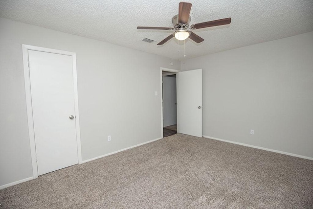 4209 W Pleasant Forest St, Arlington, TX 76015 - spare room featuring carpet, ceiling fan, and a textured ceiling