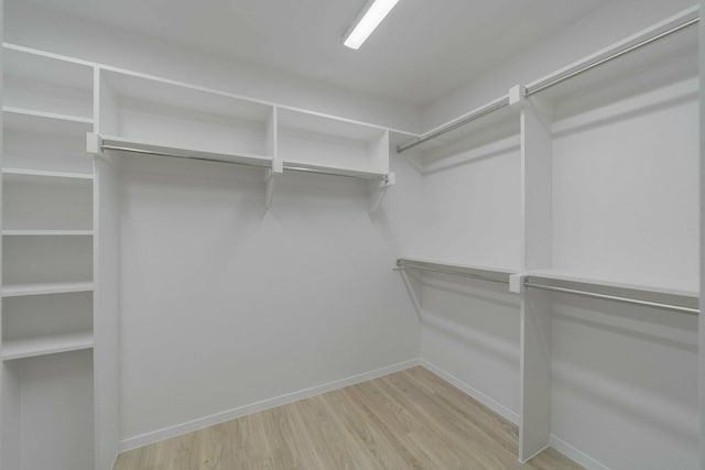 1109 Mill Spgs, Richardson, TX 75080 - spacious closet with wood finished floors