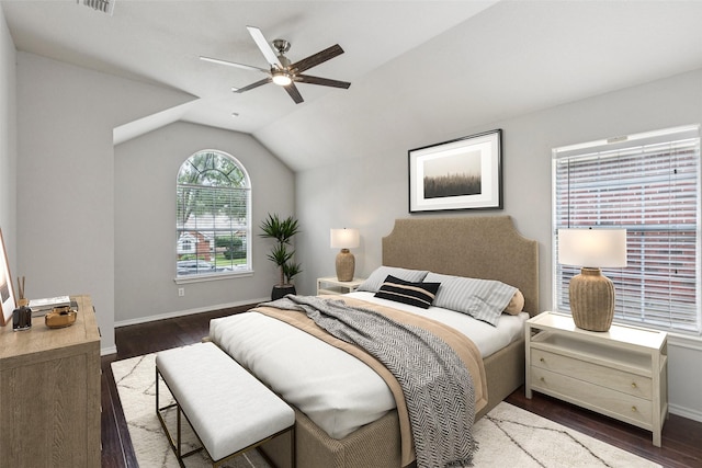 2210 Garden Crest Dr, Rockwall, TX 75087 - bedroom with dark wood-type flooring, vaulted ceiling, and a ceiling fan