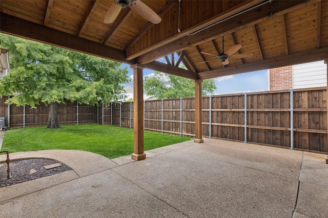 2210 Garden Crest Dr, Rockwall, TX 75087 - fenced backyard with a ceiling fan and a patio area