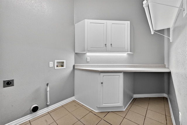 688 Lazy Acres Cir, Pottsboro, TX 75076 - laundry room with washer hookup, hookup for an electric dryer, light tile patterned flooring, and baseboards