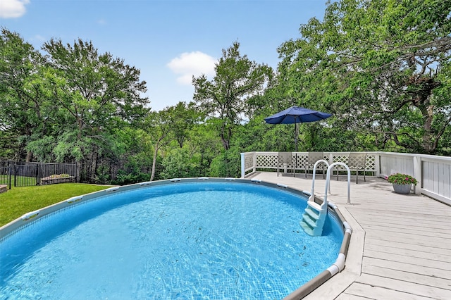 688 Lazy Acres Cir, Pottsboro, TX 75076 - outdoor pool featuring a wooden deck and view of scattered trees