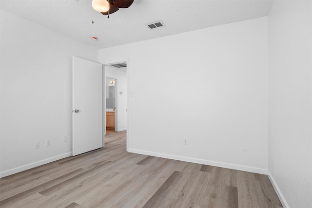 10228 Maverick Dr, Fort Worth, TX 76108 - spare room with a ceiling fan and light wood-style floors