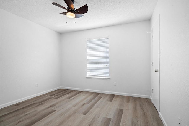 10228 Maverick Dr, Fort Worth, TX 76108 - unfurnished room featuring wood finished floors, a ceiling fan, and a textured ceiling