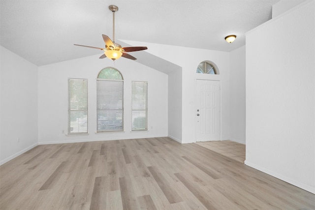 10228 Maverick Dr, Fort Worth, TX 76108 - spare room featuring a ceiling fan, light wood finished floors, and vaulted ceiling