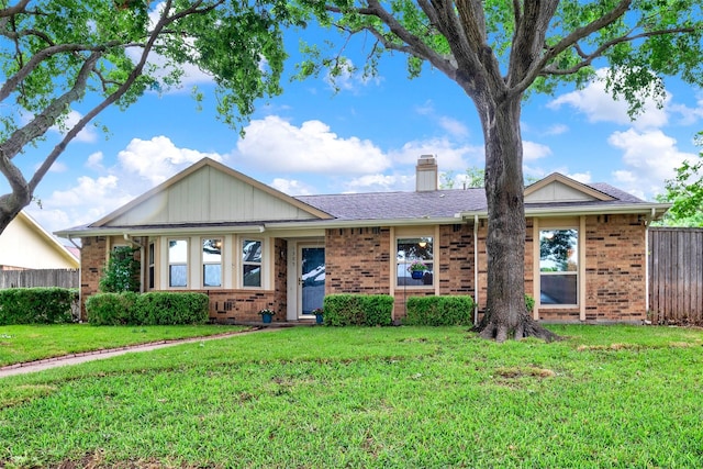 1305 Jabbet Dr, Plano, TX 75025 - ranch-style home featuring brick siding and a chimney
