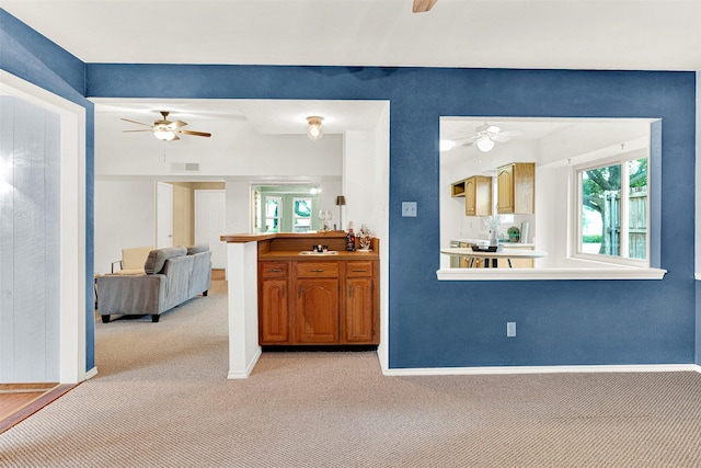 1305 Jabbet Dr, Plano, TX 75025 - living area with a ceiling fan and light carpet