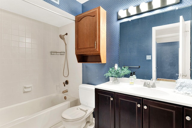 1305 Jabbet Dr, Plano, TX 75025 - full bathroom with wallpapered walls, vanity, and  shower combination