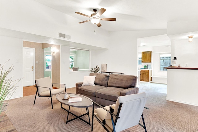 1305 Jabbet Dr, Plano, TX 75025 - living room featuring lofted ceiling, ceiling fan, and light carpet