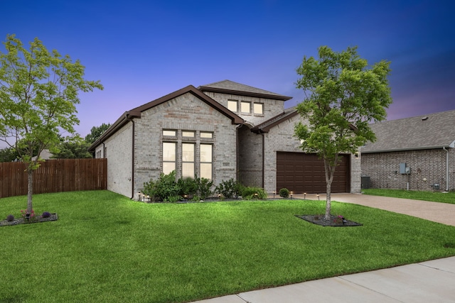 3205 Tradition Ct, Rowlett, TX 75088 - view of front of house with concrete driveway, a garage, and brick siding